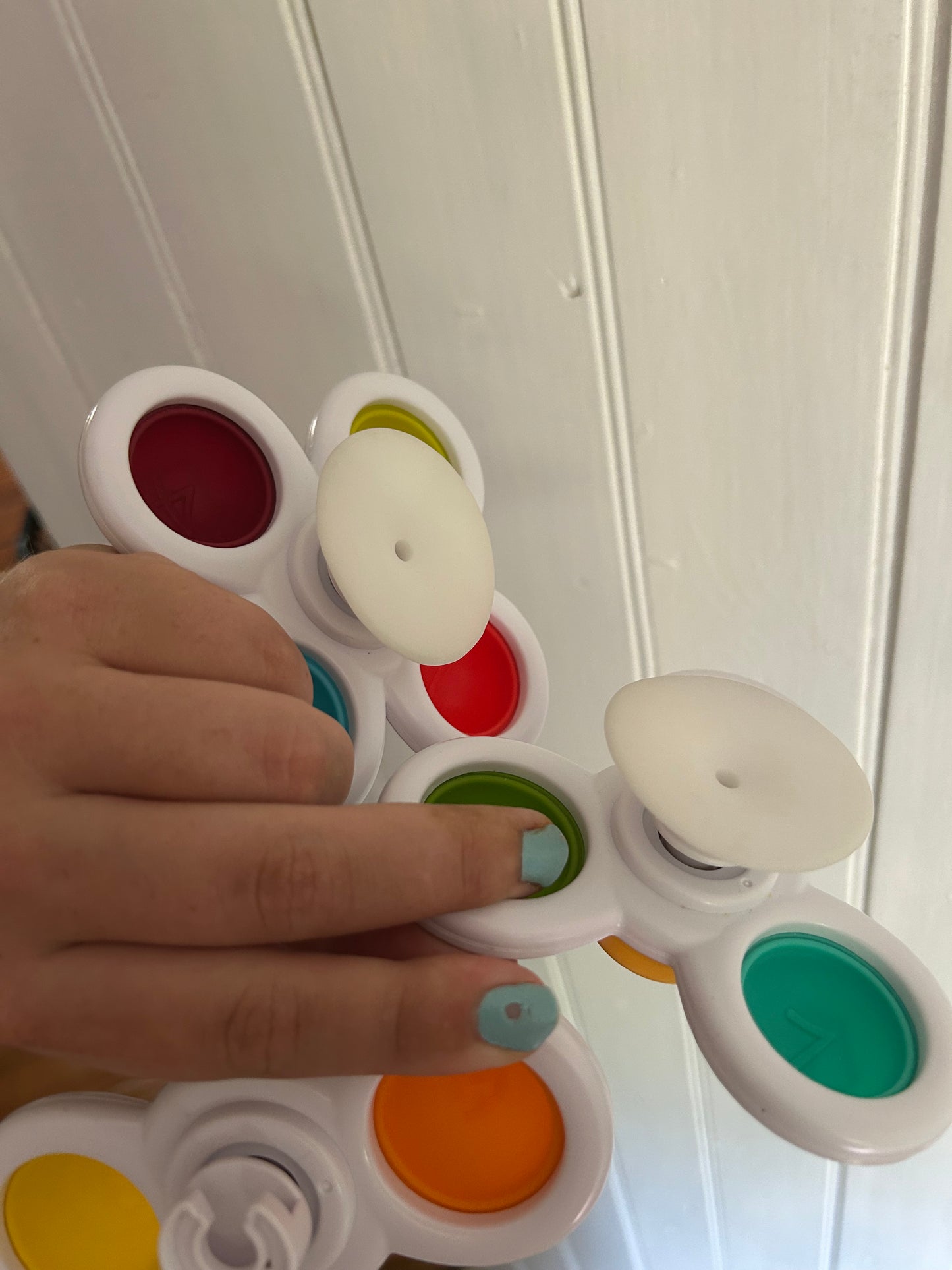 Suction fidget spinners