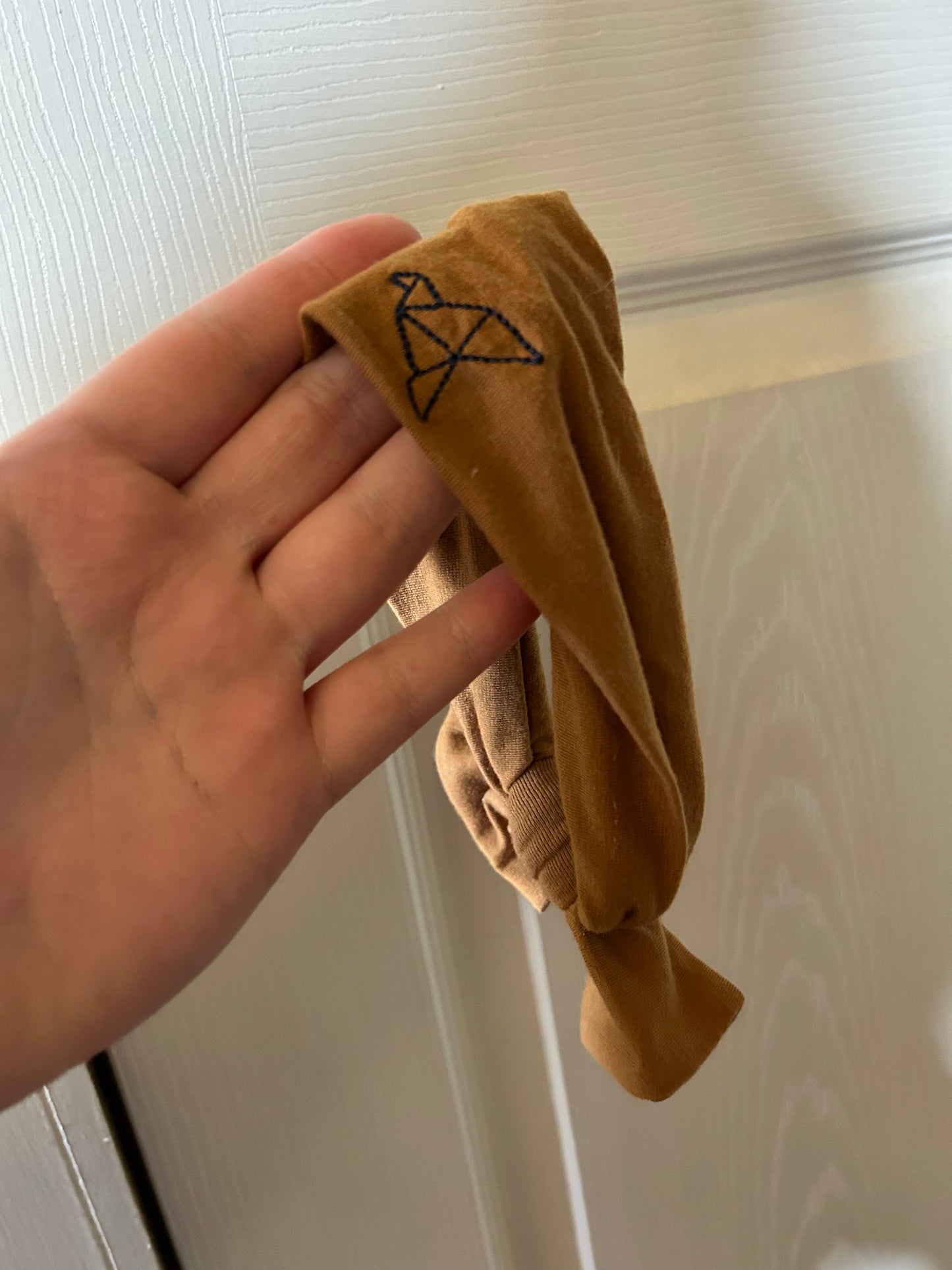 Copper Pearl infant brown bow