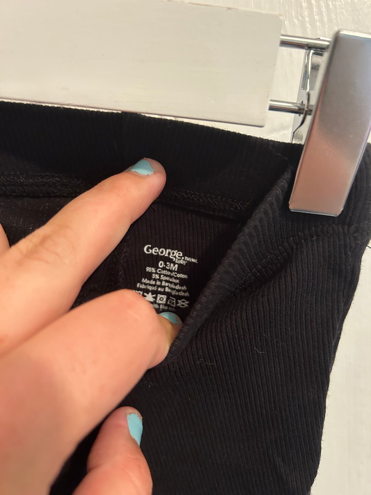 George 0/3m black ribbed flare pants