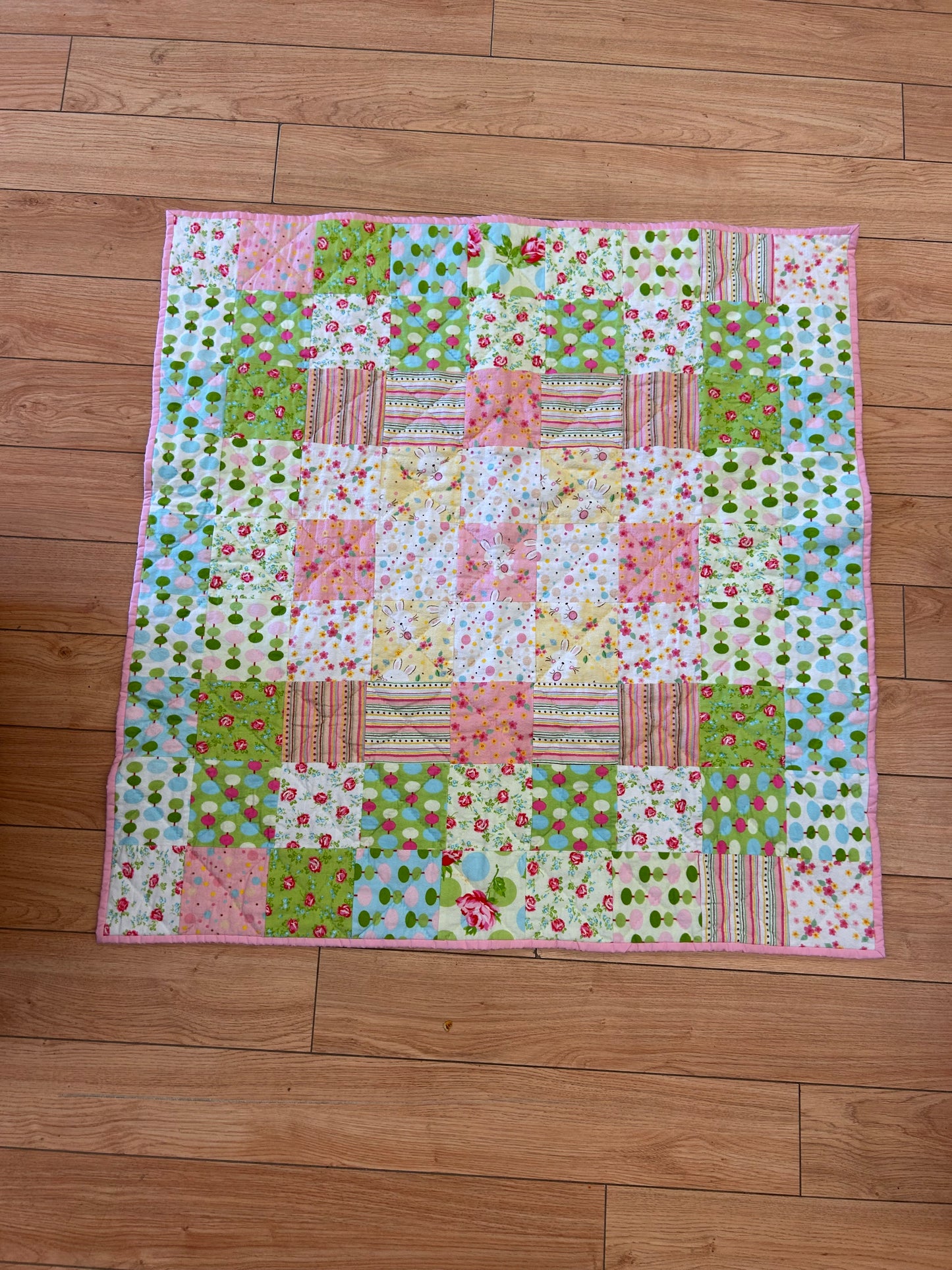 Floral patchwork crib quilt