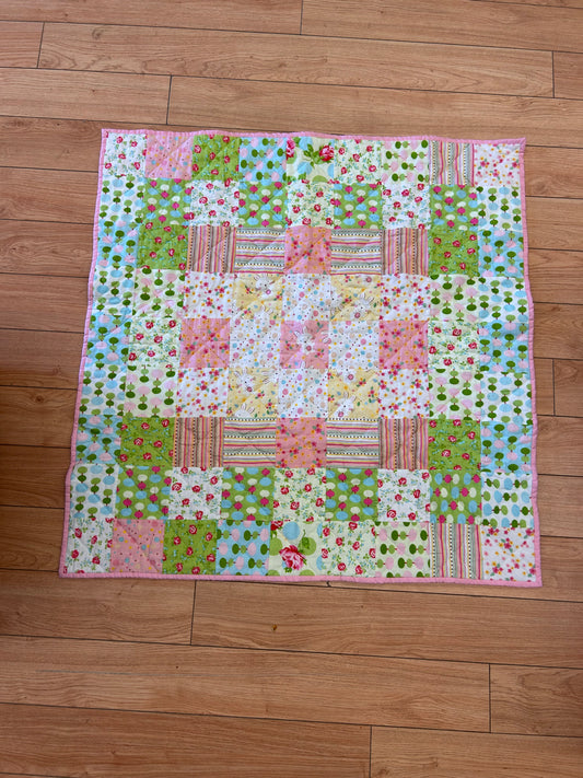 Floral patchwork crib quilt