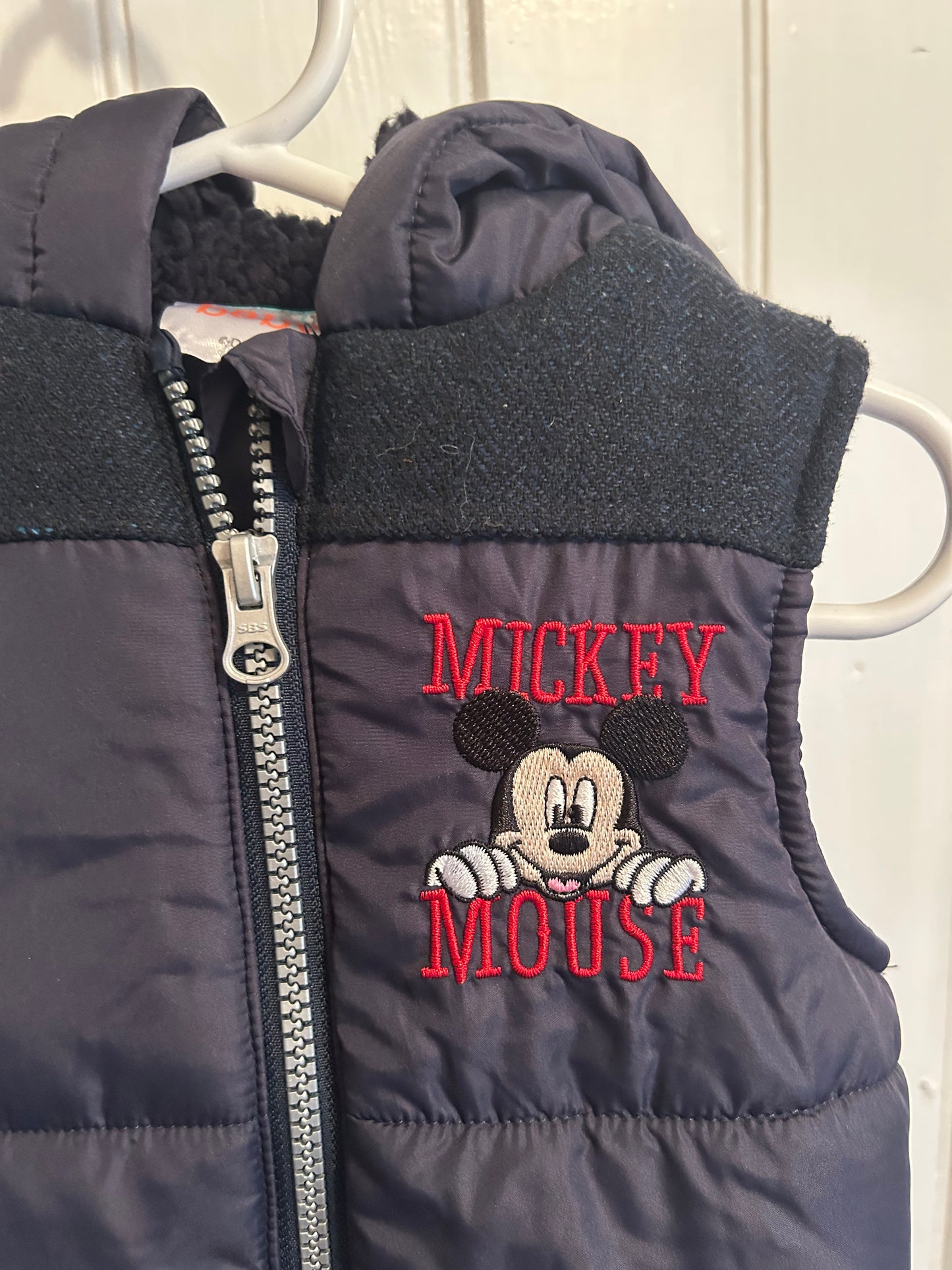 Disney 12/18m navy Mickey puffer vest