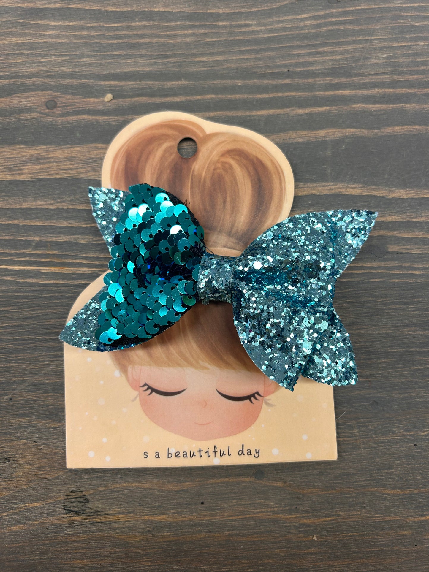 Sequin flip bows