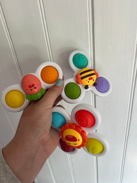 Suction fidget spinners