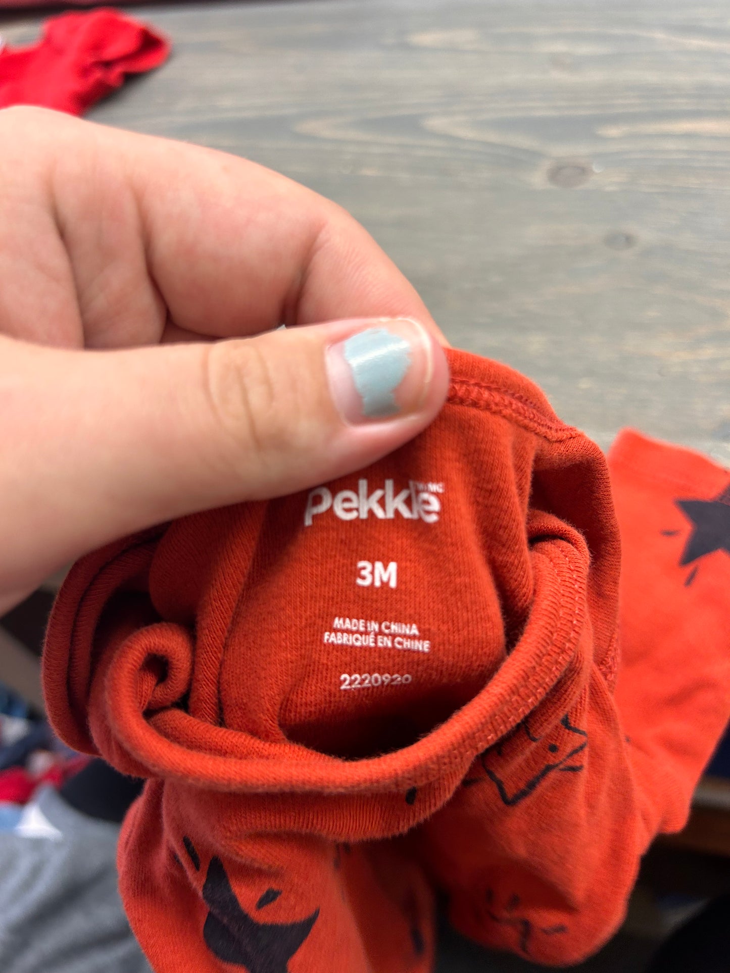 Pekkle 3m orange star onesie