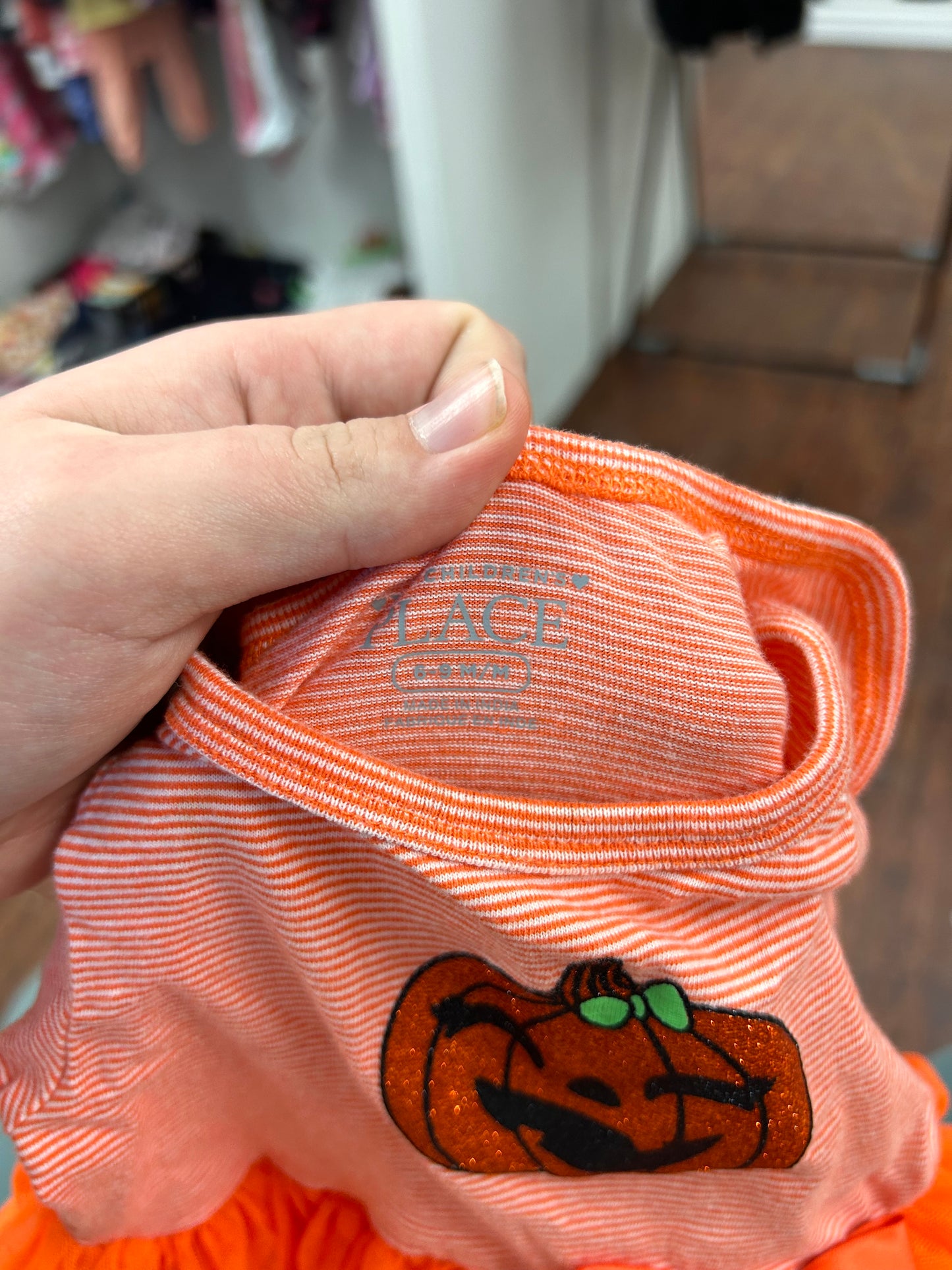 Children’s place 6/9m pumpkin onsie dress