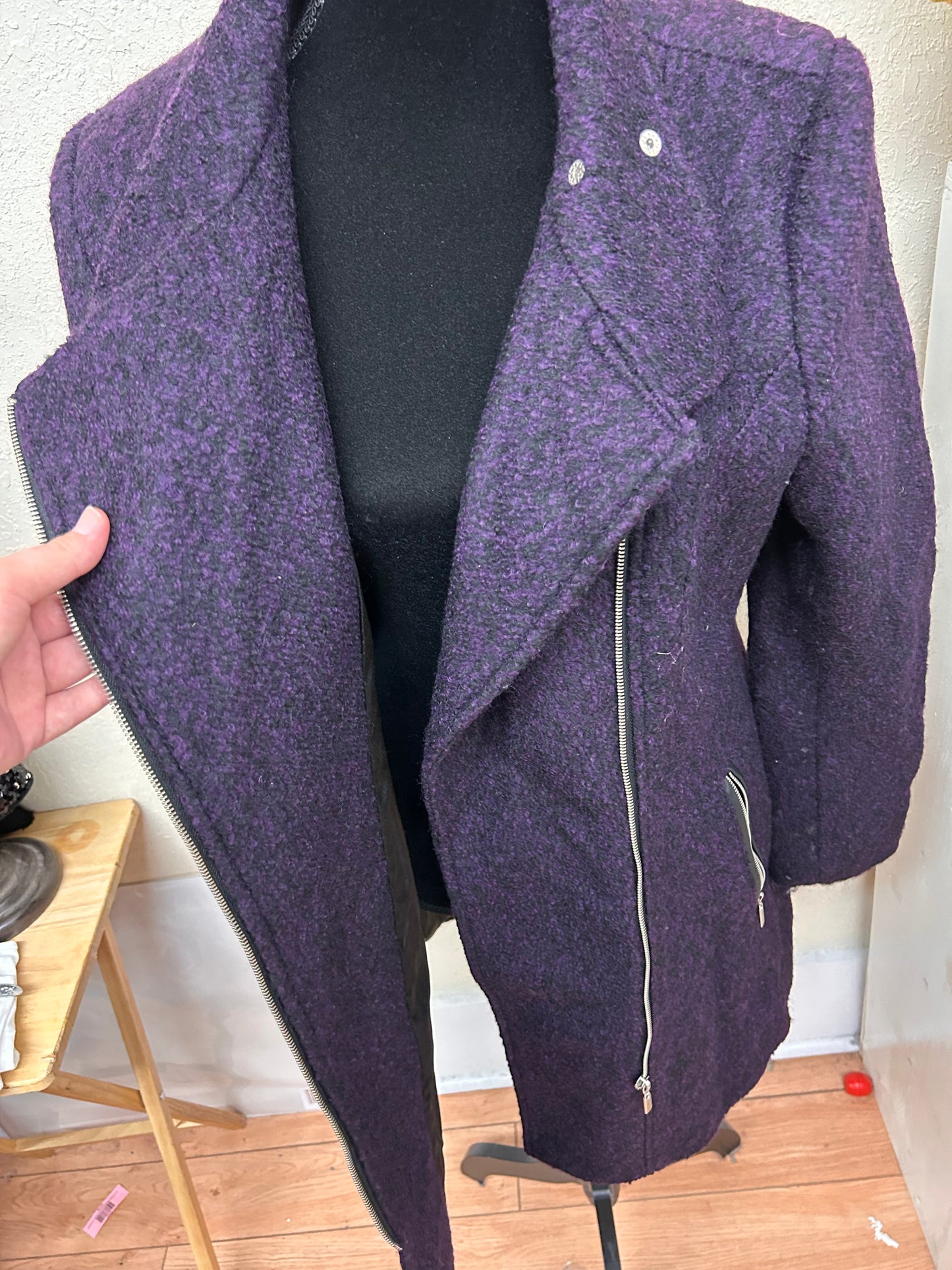 Ricki’s large purple felt jacket