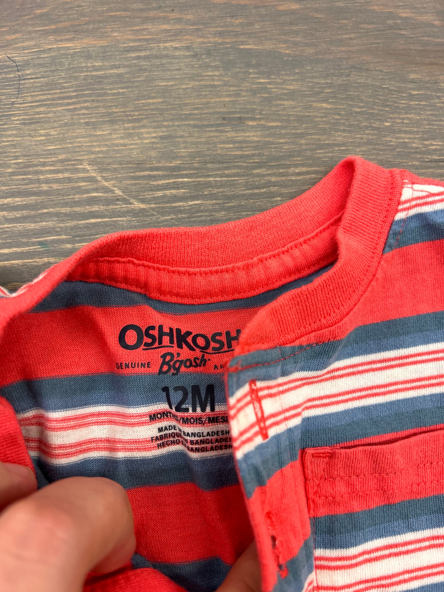 Oshkosh 12m red & blue striped onesie