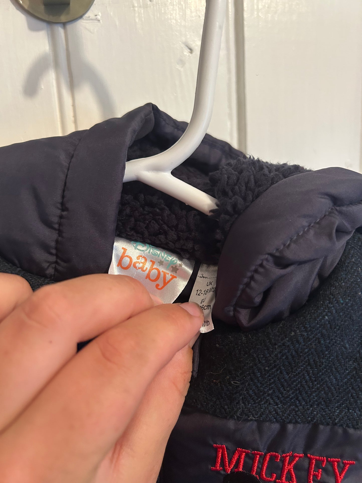 Disney 12/18m navy Mickey puffer vest