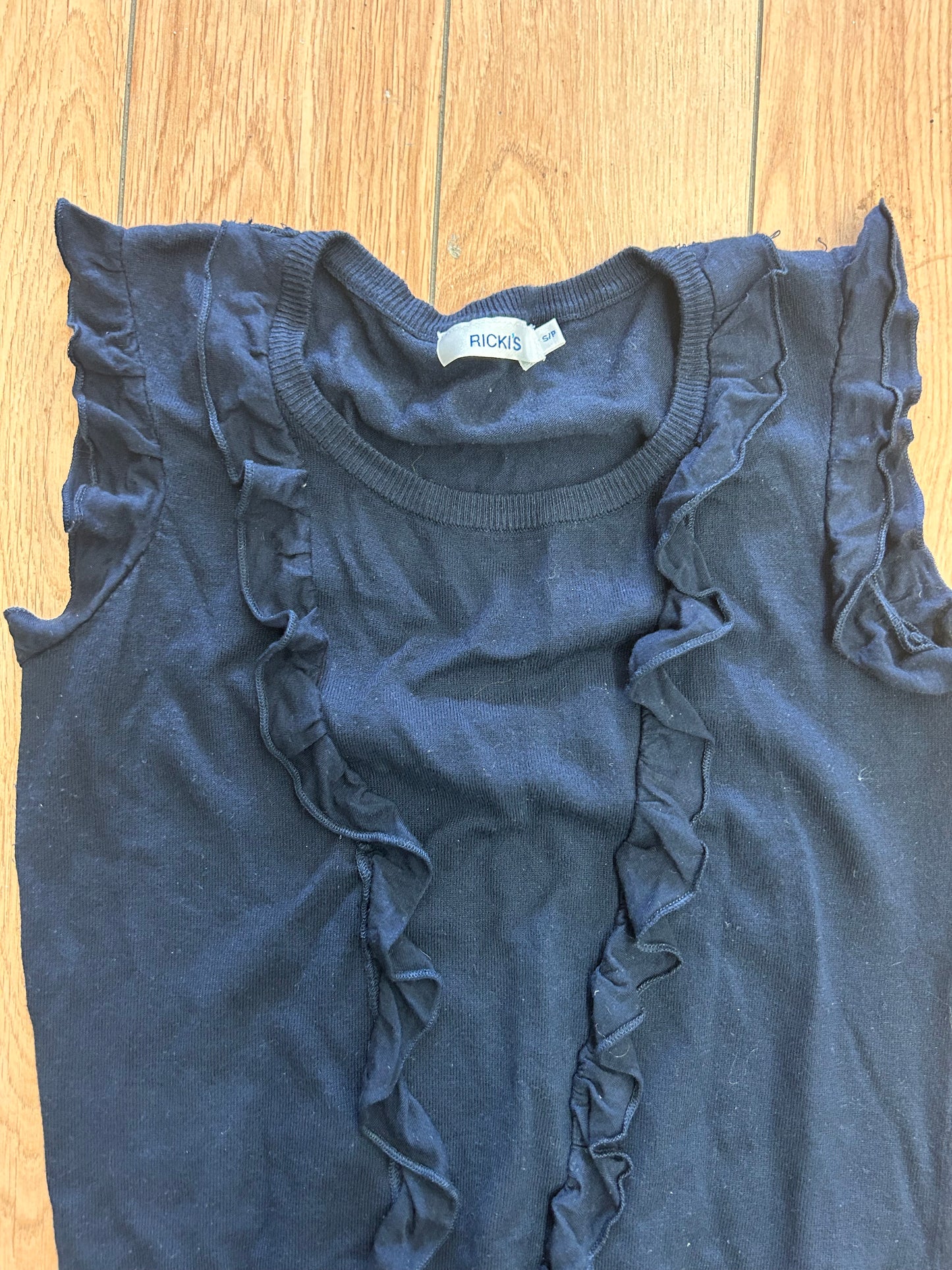 Rickis small black ruffle blouse