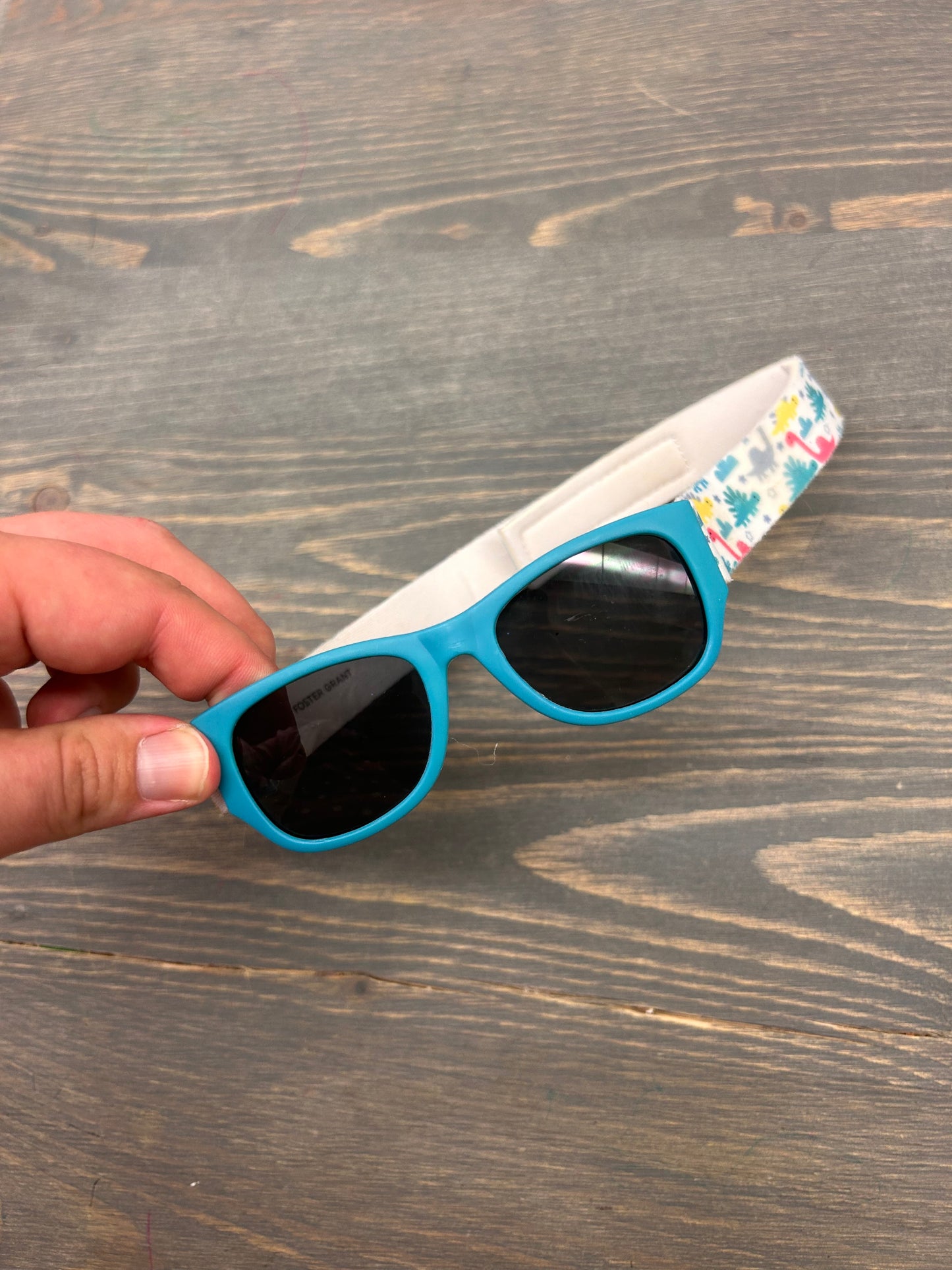 Infant blue sunnies with Dino strap