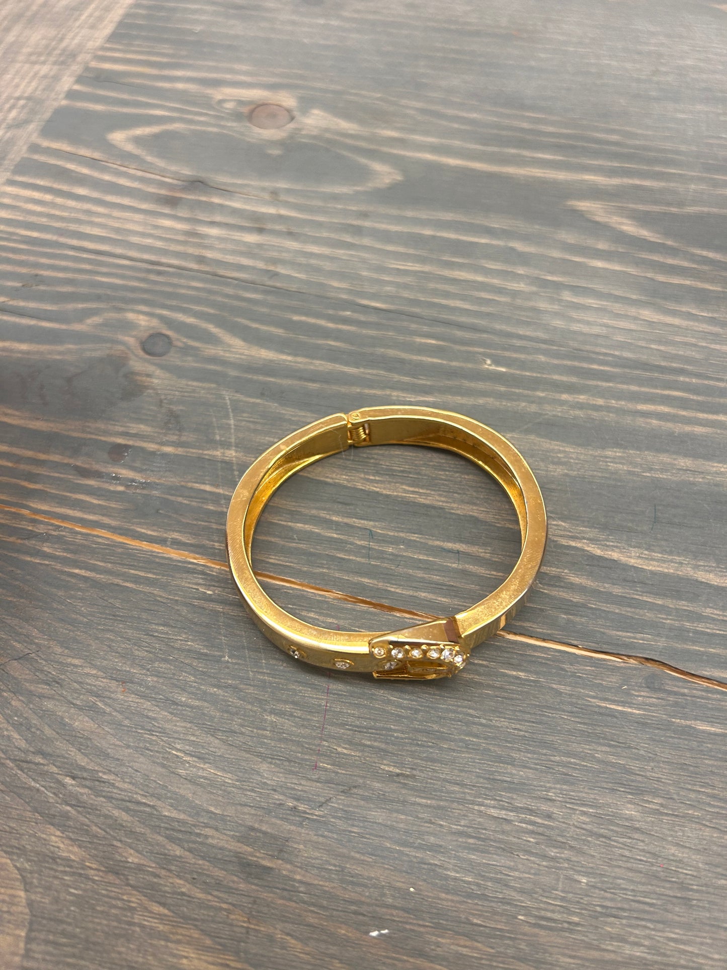 Gold snap buckle looking Bracelet