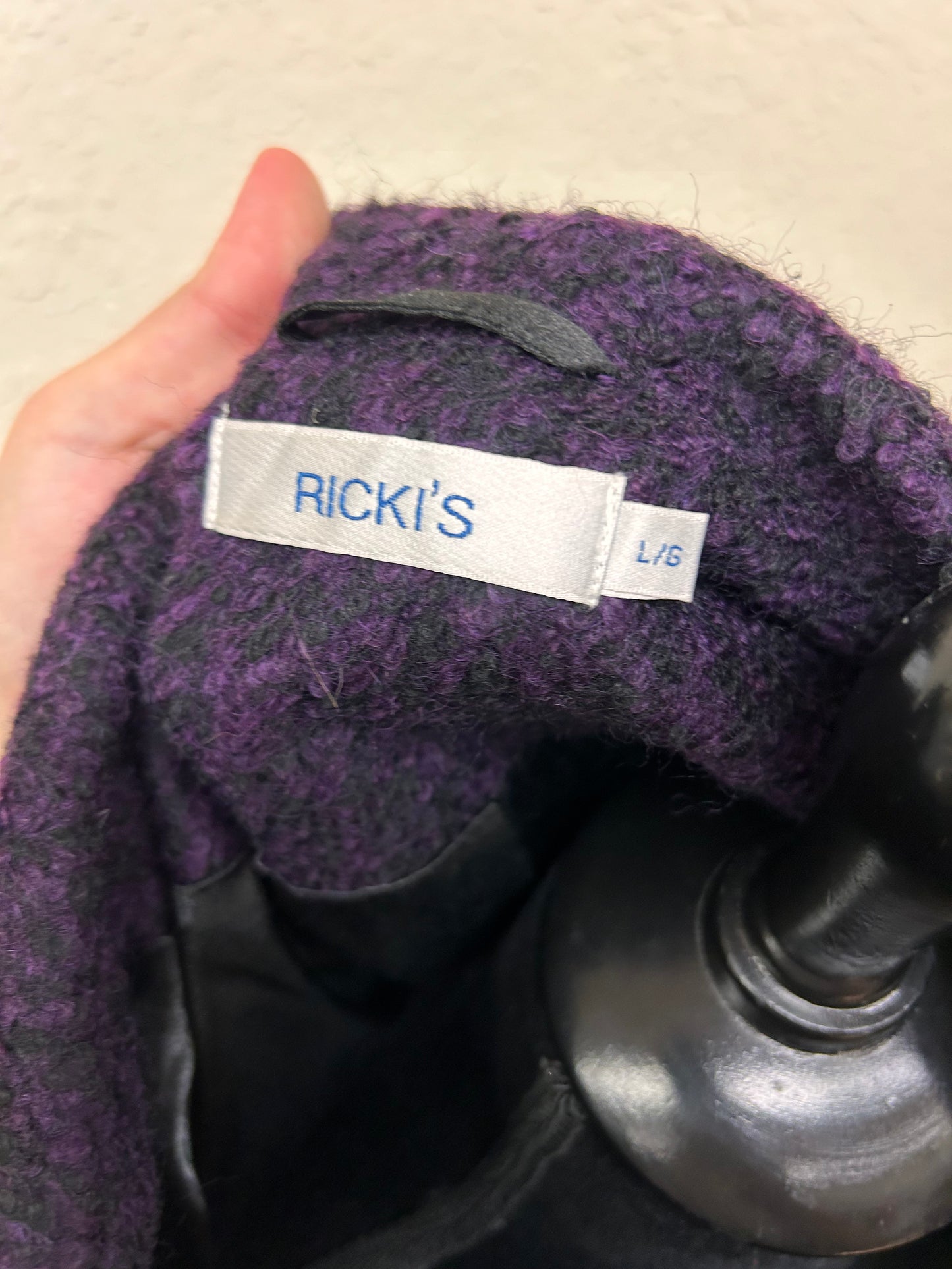 Ricki’s large purple felt jacket