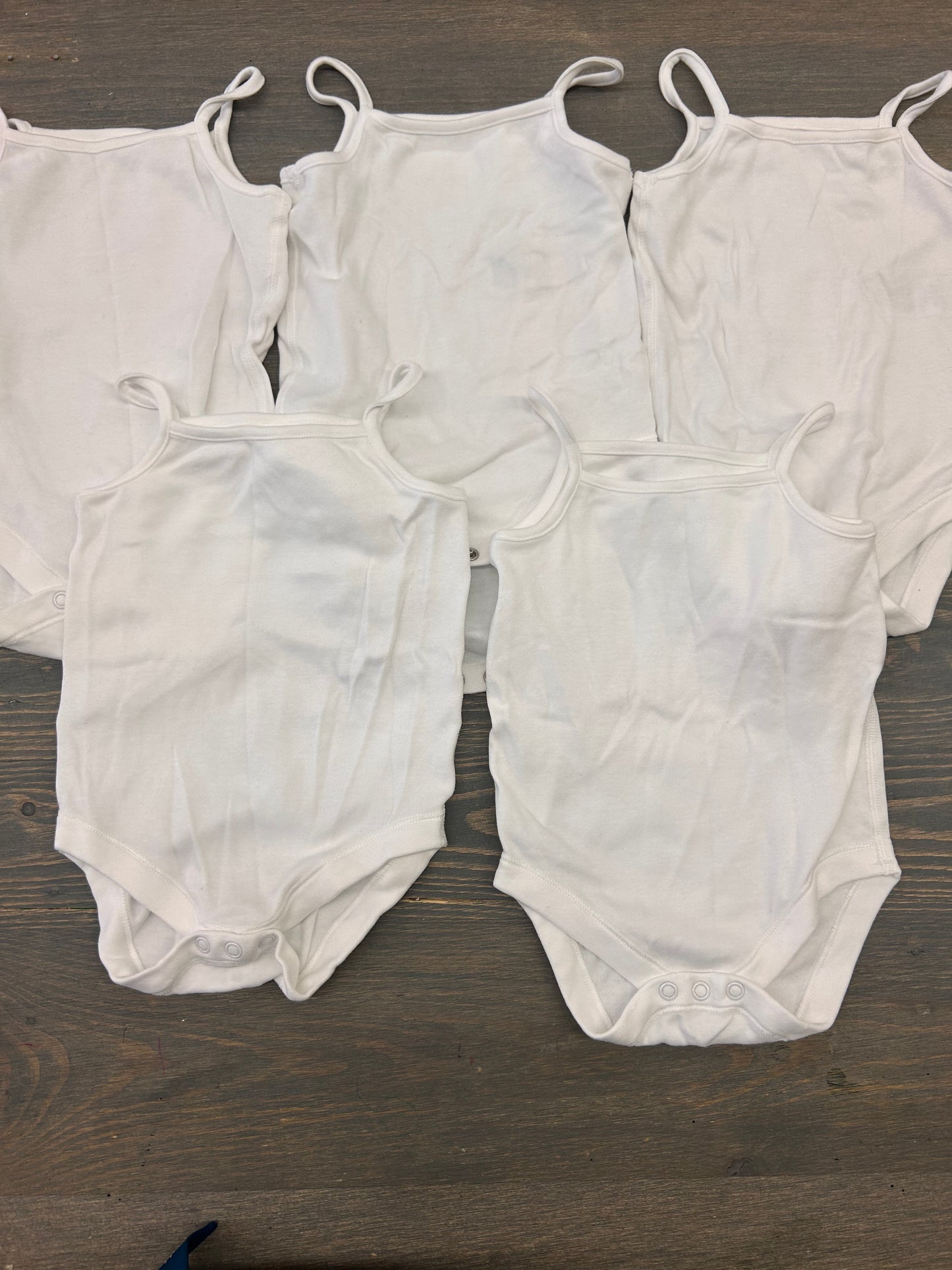 Bundle of 5 M&S 6/9m white tank onesies