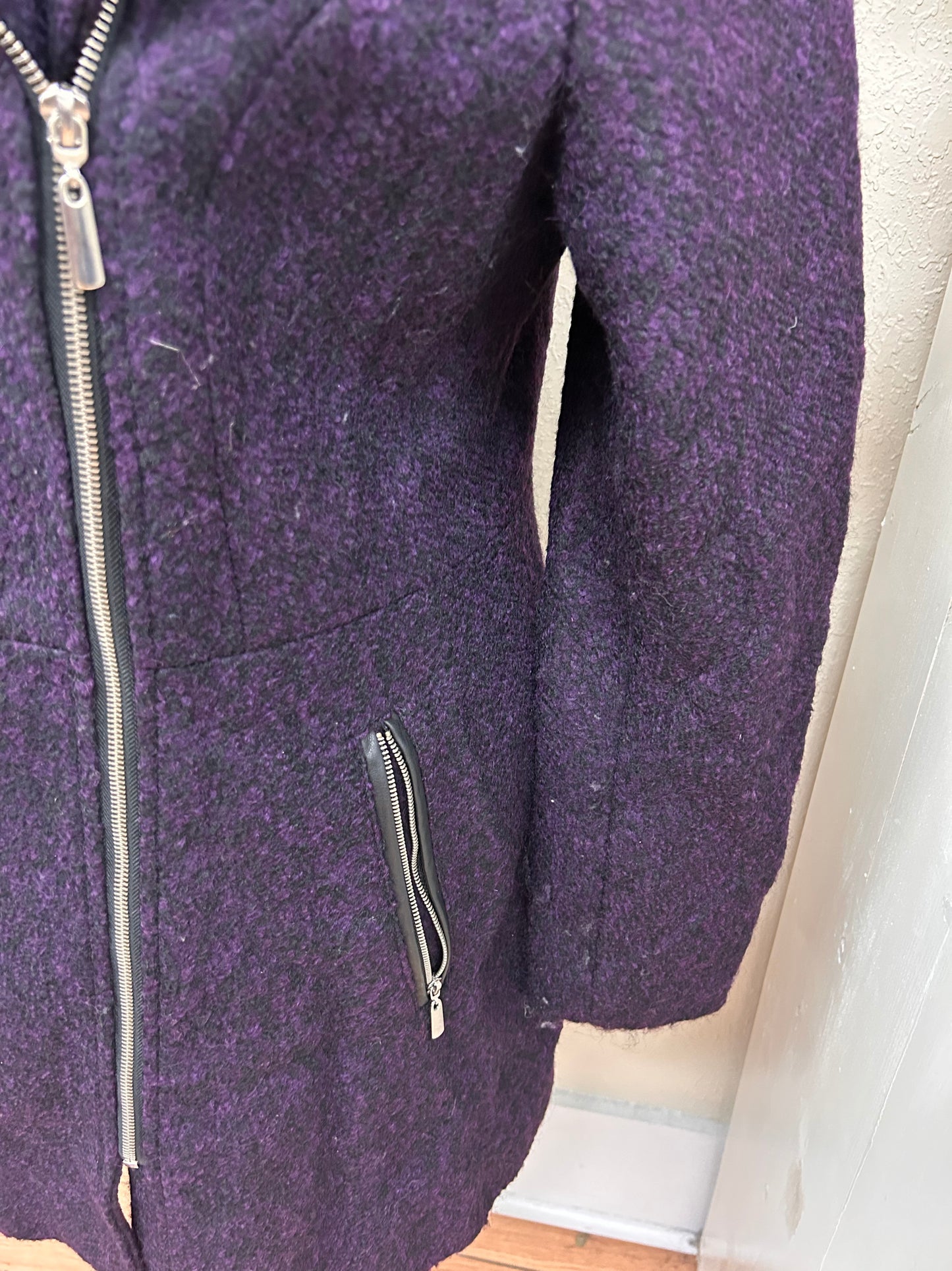 Ricki’s large purple felt jacket