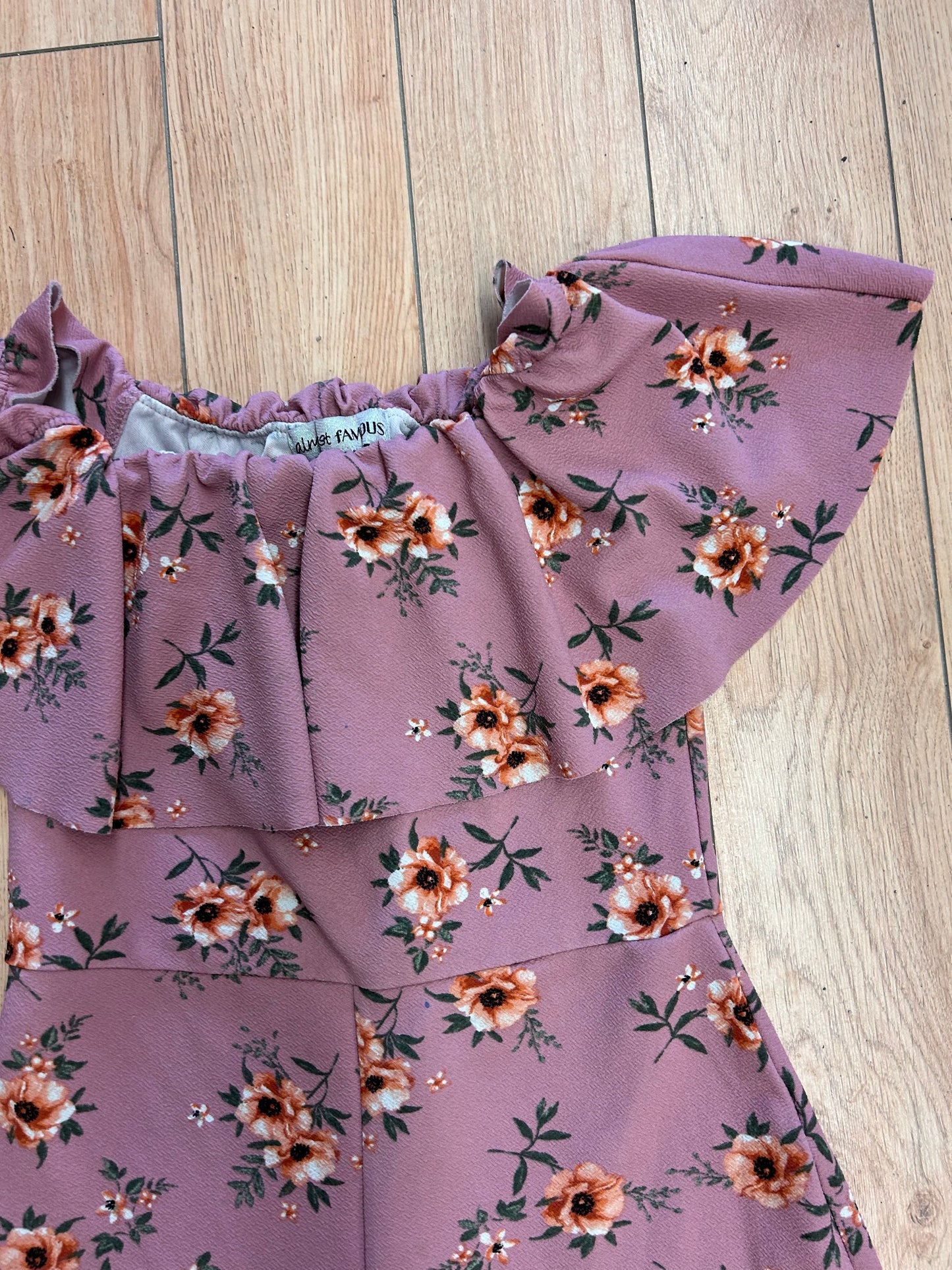 Almost famous large pink floral romper