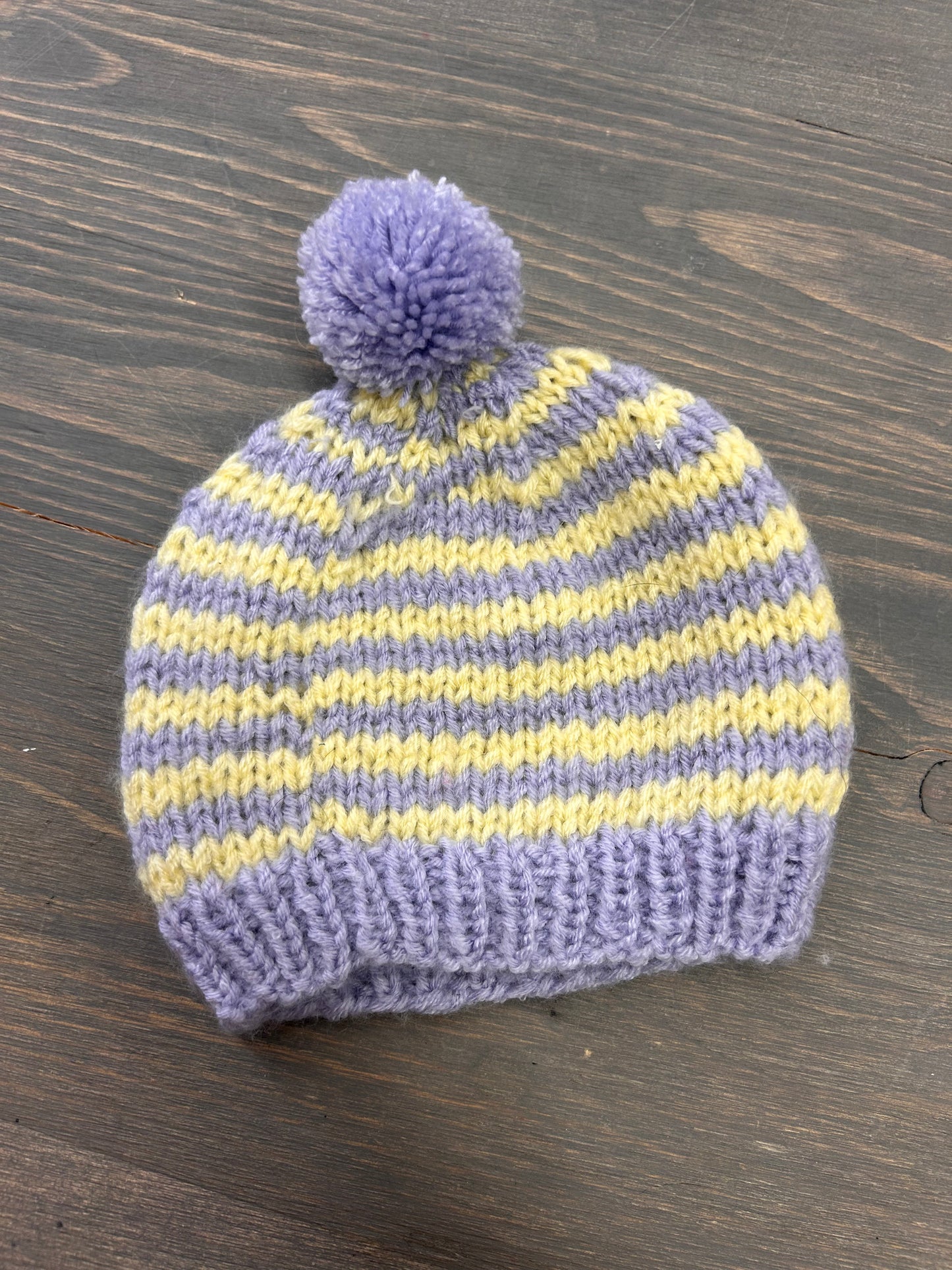 Handmade knit infant hats