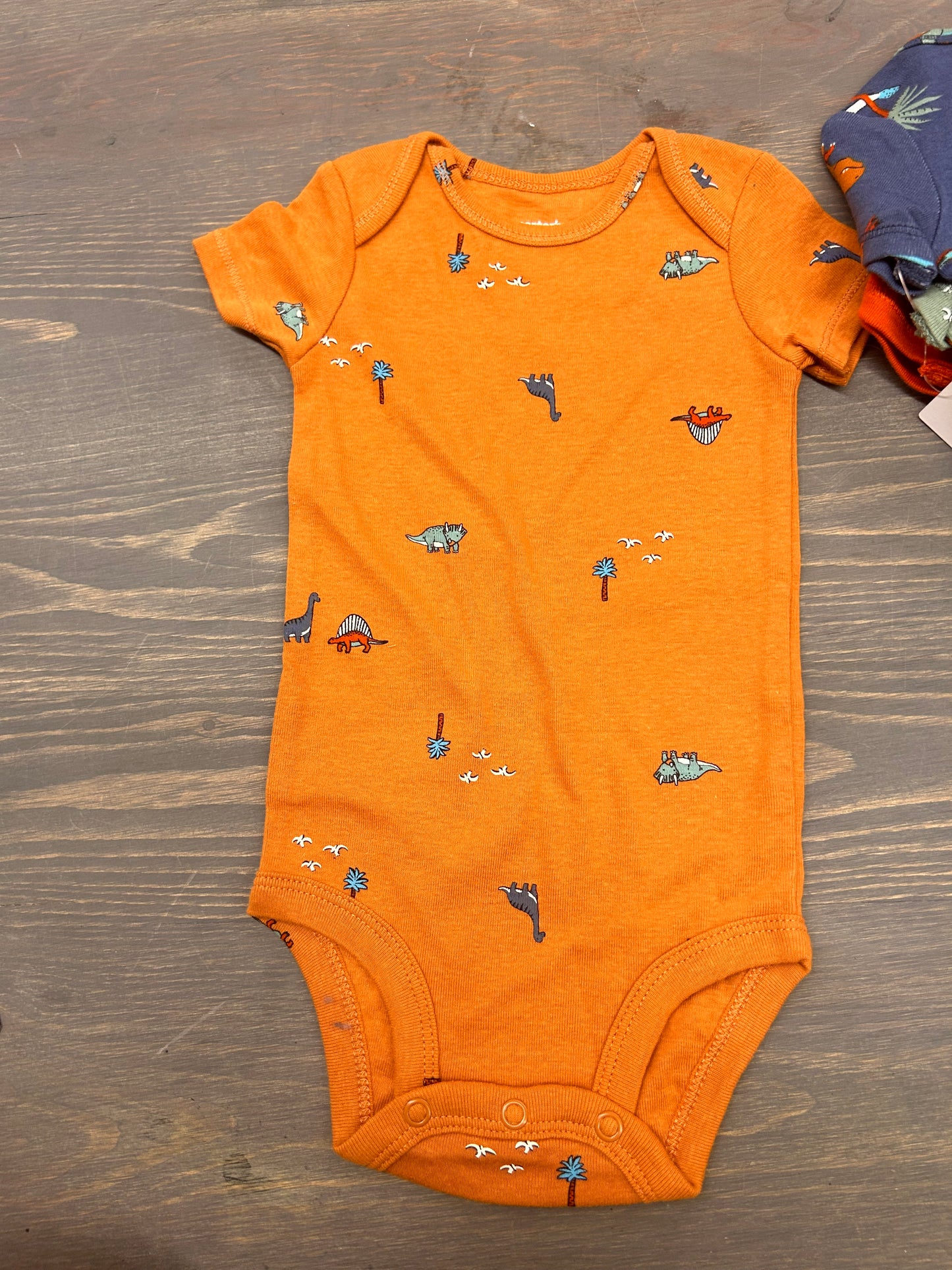 NEW carters 6m 4pk Dino onesies