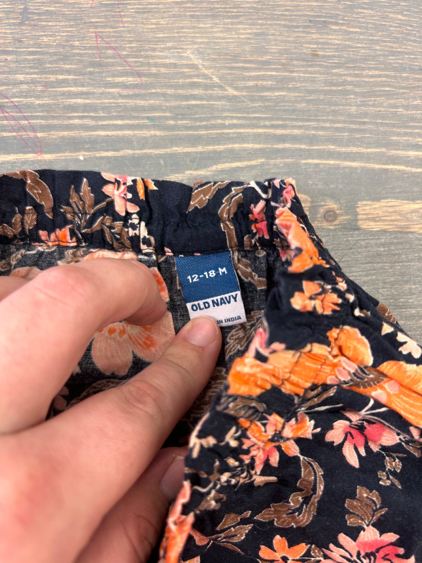 Old navy 12/18m orange floral shorts