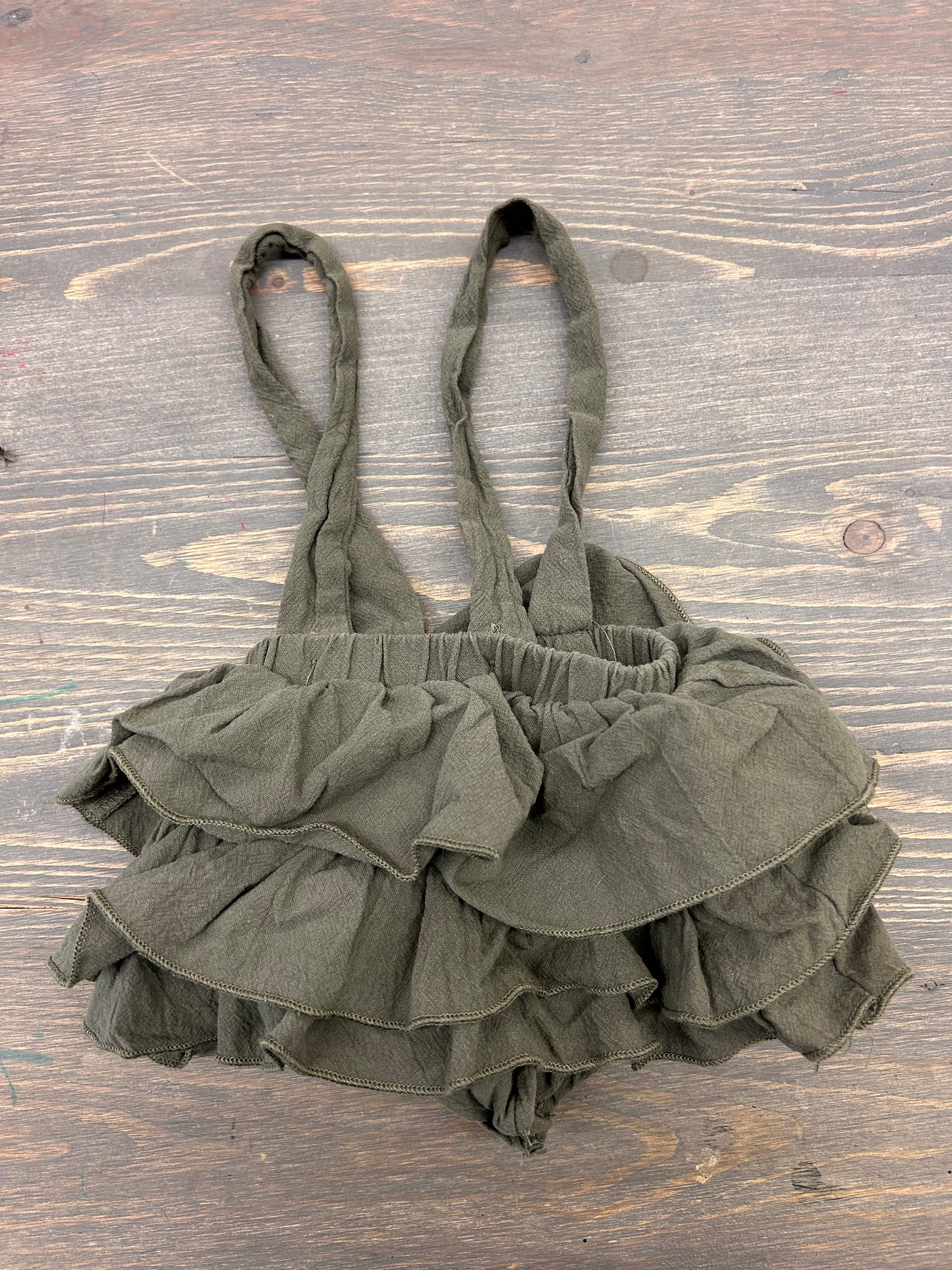 0/3m green ruffle skirted overalls