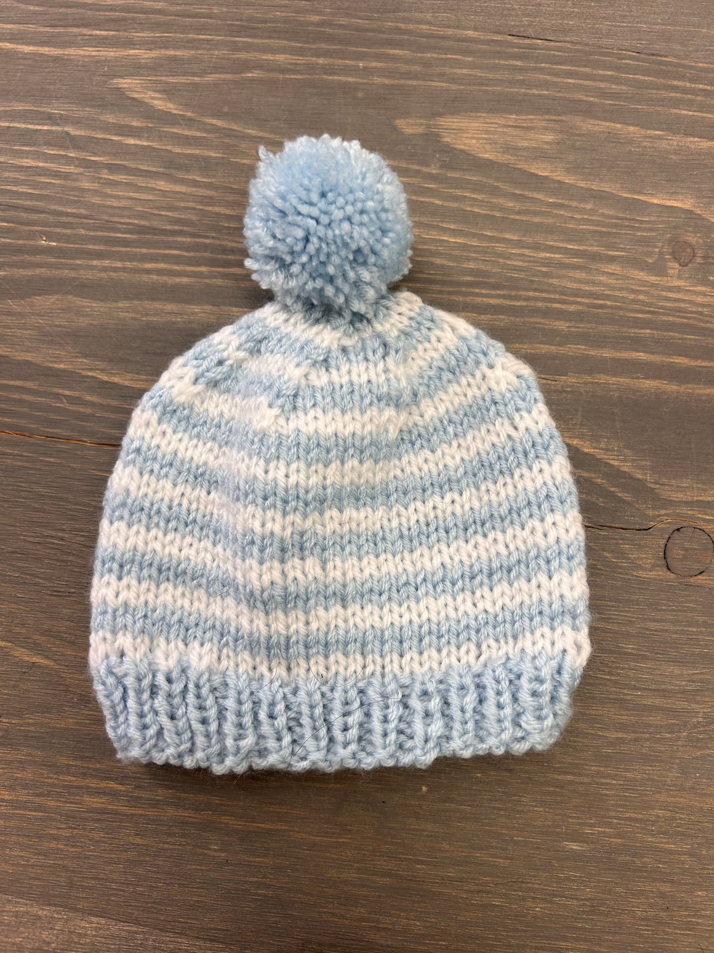 Handmade knit infant hats