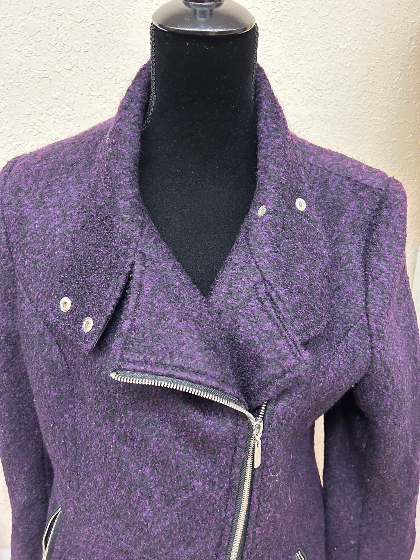 Ricki’s large purple felt jacket