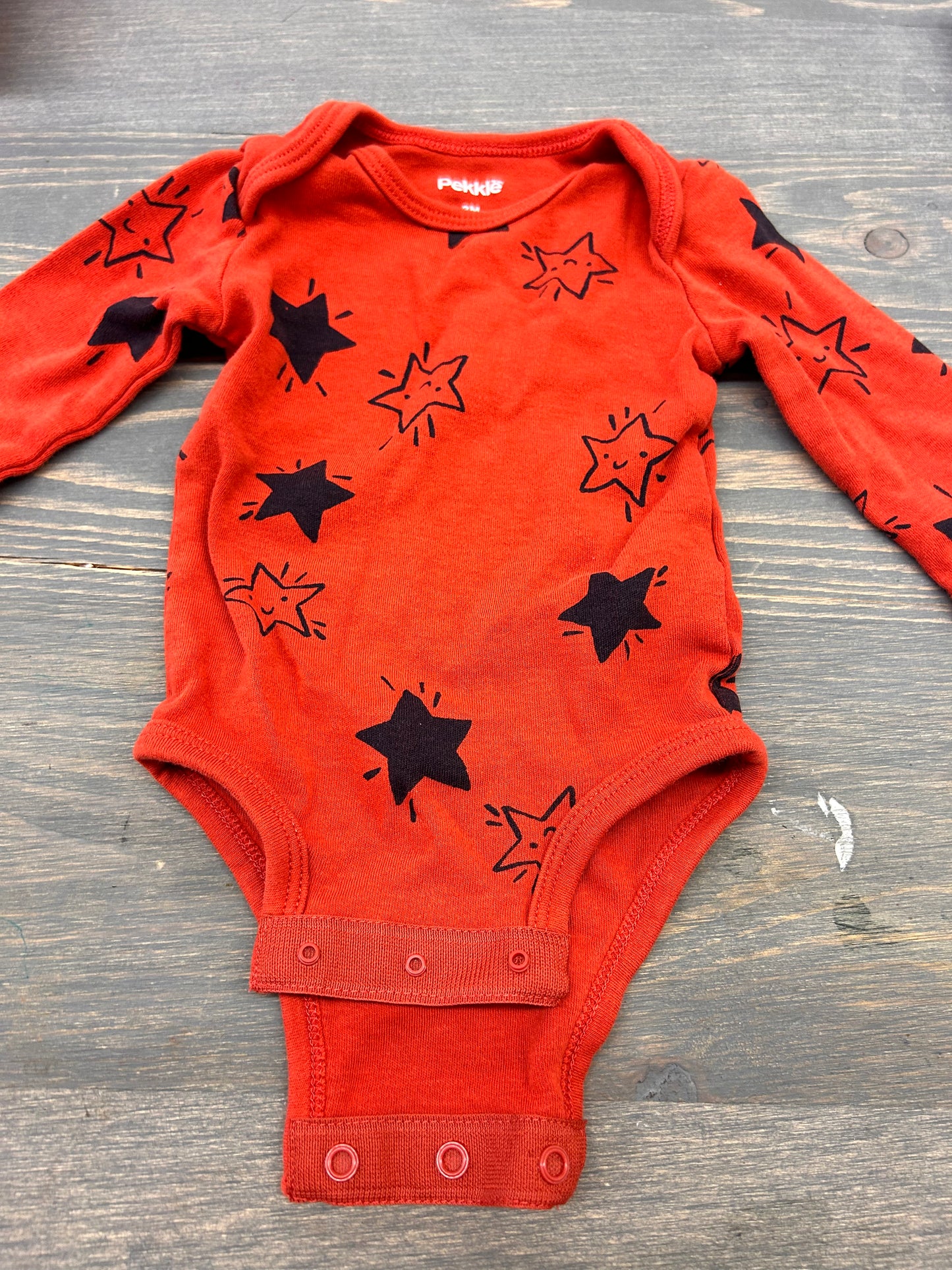 Pekkle 3m orange star onesie