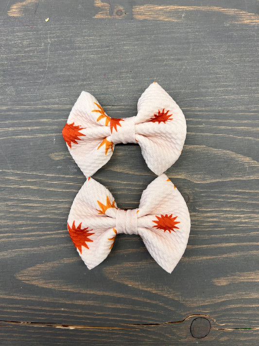 Orange star bows