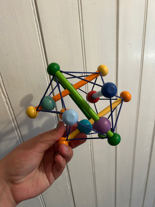 Manhattan toys wooden bead rattle toy